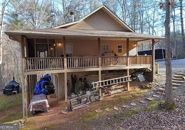 rear view of house with a deck