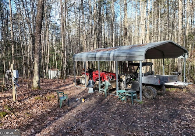 view of yard with a carport