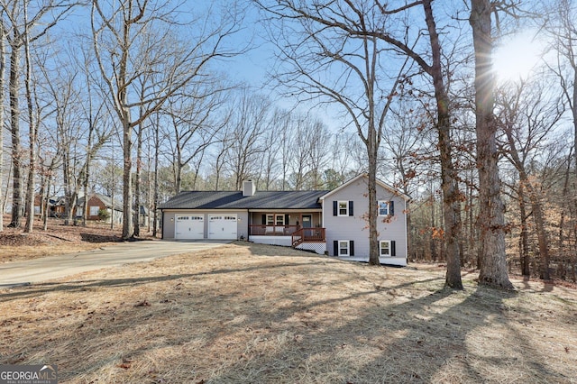 view of front of home with a garage