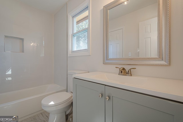 bathroom featuring tub / shower combination, toilet, marble finish floor, and vanity