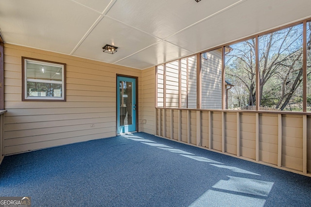 view of unfurnished sunroom