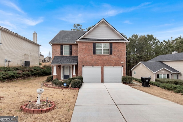 traditional-style house with brick siding, central air condition unit, a shingled roof, concrete driveway, and an attached garage