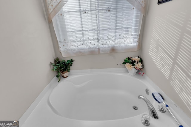 full bathroom with a tub to relax in