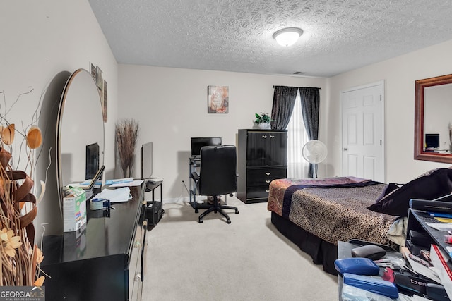 carpeted bedroom with a textured ceiling and visible vents