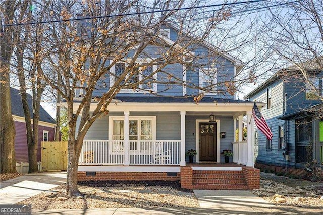 view of property featuring a porch