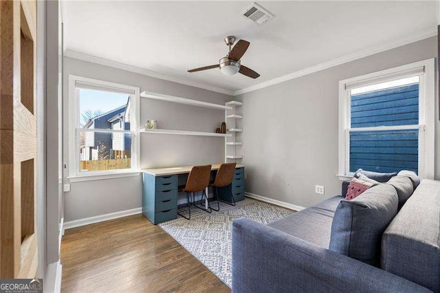 office with hardwood / wood-style flooring, ceiling fan, and crown molding