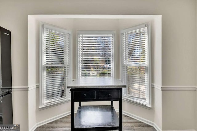 office space with hardwood / wood-style flooring