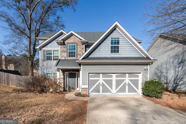 craftsman-style home with a garage