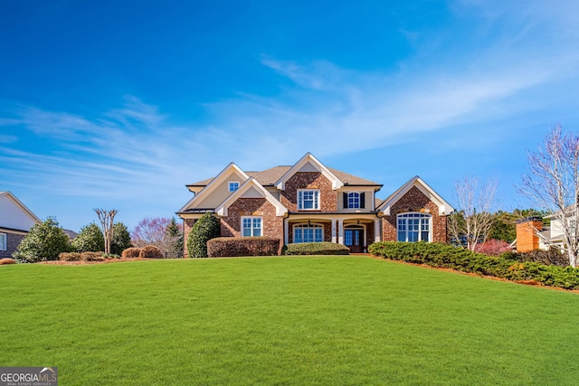 view of front of home featuring a front yard