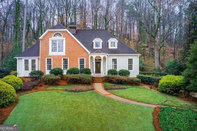 view of front of home with a front lawn