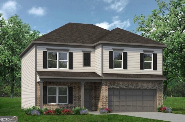 view of front facade featuring a front yard and a garage