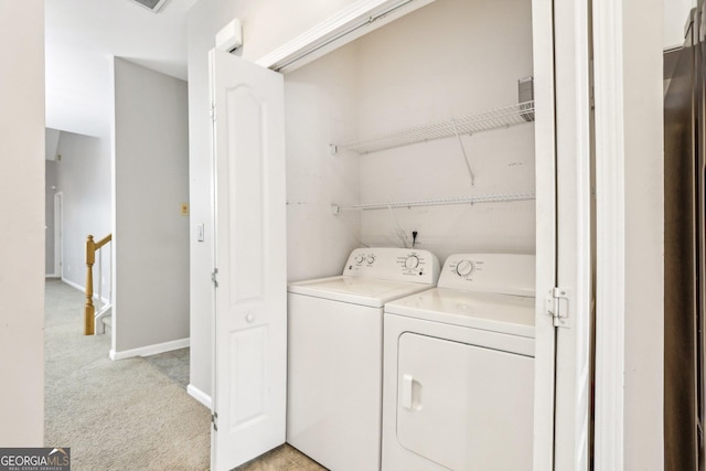 2414 Clock Face Ct, Lawrenceville, GA 30043 - laundry room with independent washer and dryer and light carpet