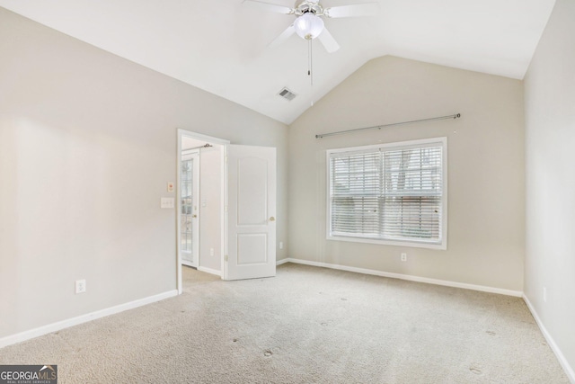 2414 Clock Face Ct, Lawrenceville, GA 30043 - empty room with ceiling fan, lofted ceiling, and light carpet