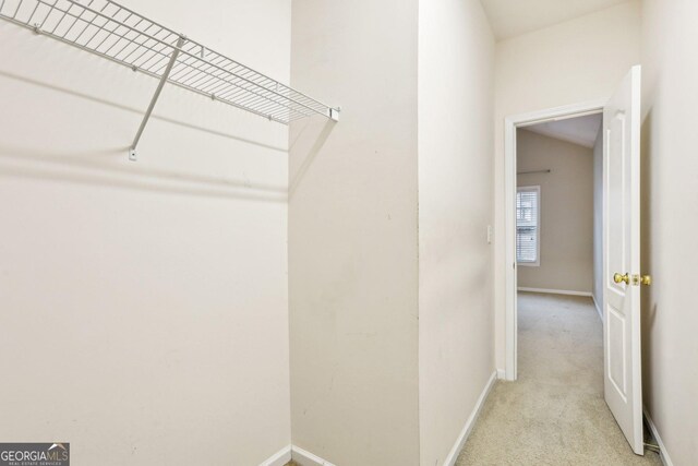 2414 Clock Face Ct, Lawrenceville, GA 30043 - spacious closet with light colored carpet