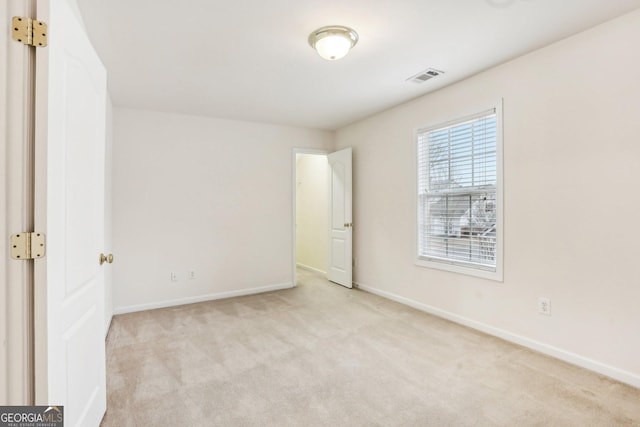 2414 Clock Face Ct, Lawrenceville, GA 30043 - carpeted empty room with baseboards