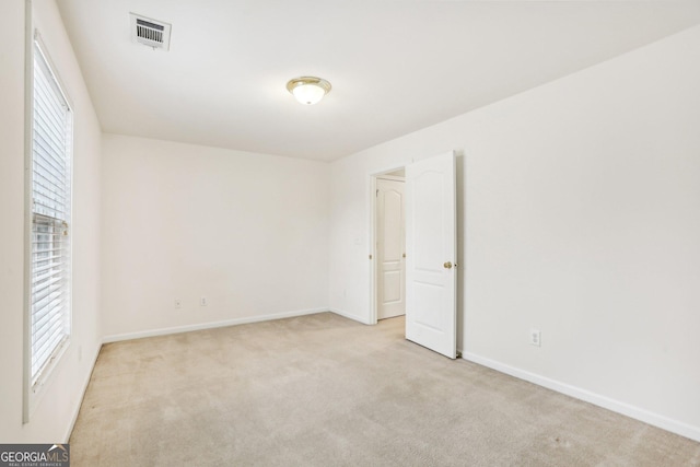 2414 Clock Face Ct, Lawrenceville, GA 30043 - spare room featuring carpet floors and baseboards