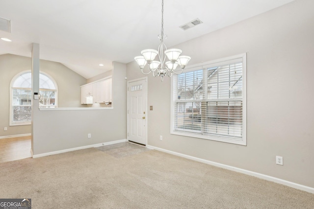 2414 Clock Face Ct, Lawrenceville, GA 30043 - unfurnished room with a chandelier, light carpet, vaulted ceiling, and recessed lighting