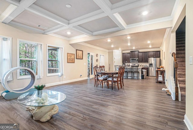 dining space featuring coffered ceiling, beamed ceiling, crown molding, and dark hardwood / wood-style floors