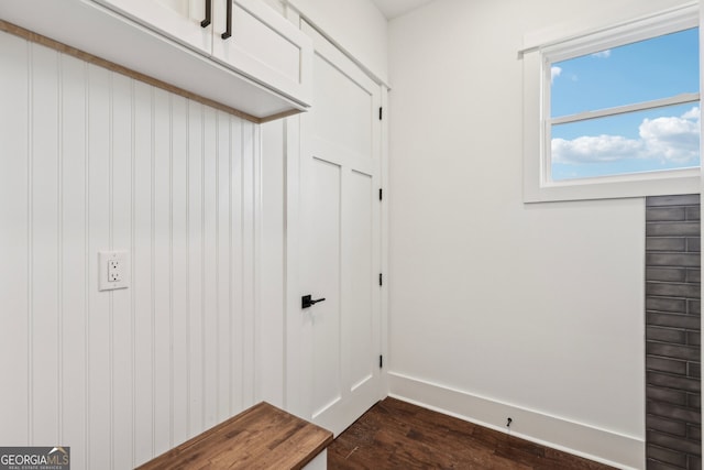 mudroom with dark hardwood / wood-style floors