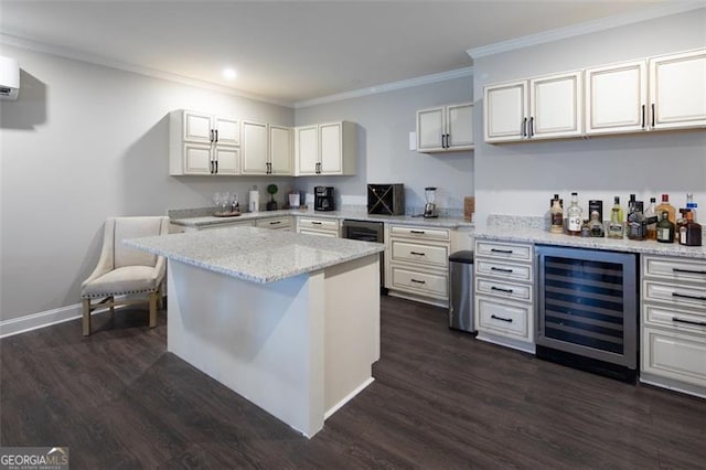 kitchen featuring light stone countertops, beverage cooler, dark wood-style floors, and white cabinets