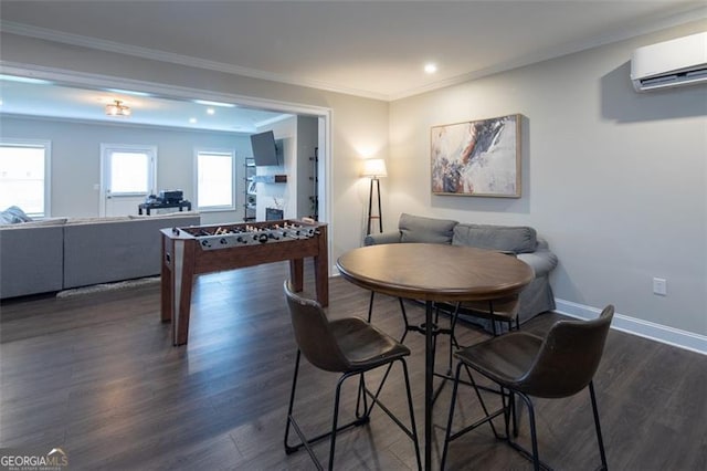 dining area with dark wood finished floors, recessed lighting, a wall mounted AC, ornamental molding, and baseboards