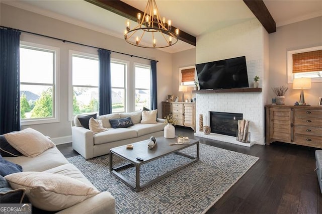 living area featuring dark wood-style floors, beamed ceiling, a brick fireplace, and a wealth of natural light