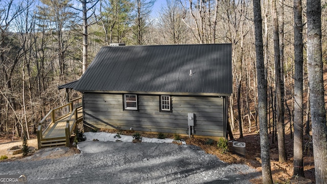 view of side of home featuring a garage