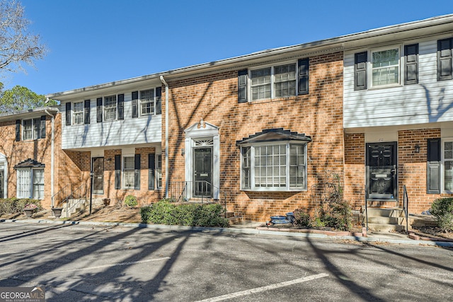 multi unit property featuring brick siding