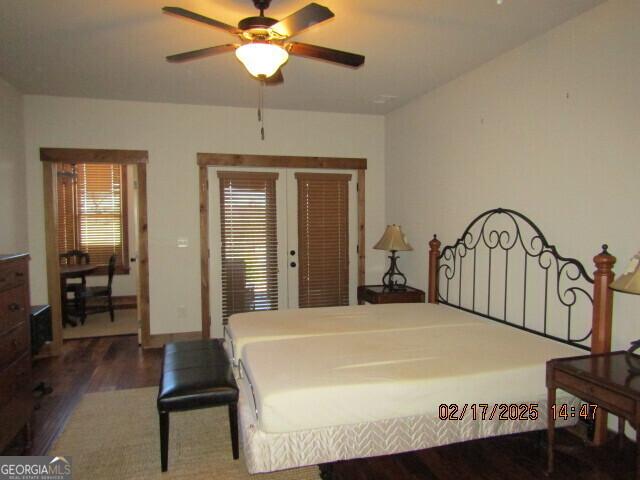 bedroom featuring hardwood / wood-style floors and ceiling fan