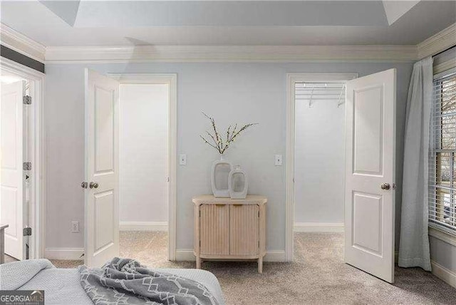 carpeted bedroom featuring ornamental molding