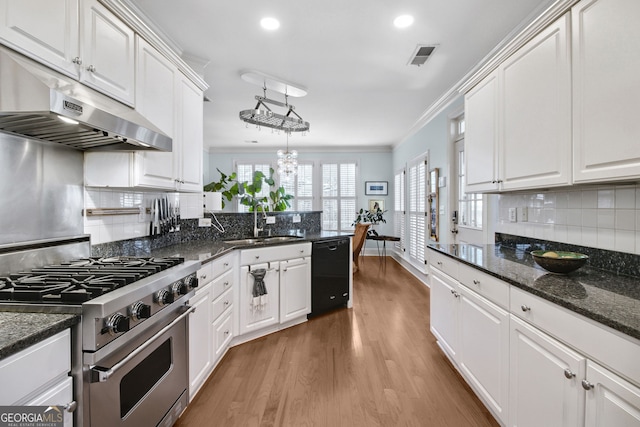 kitchen with white cabinetry, gas stove, black dishwasher, sink, and pendant lighting