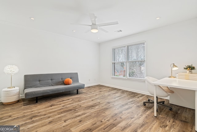 office area with hardwood / wood-style floors, crown molding, and ceiling fan