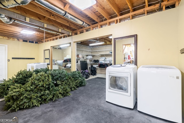 laundry room with independent washer and dryer