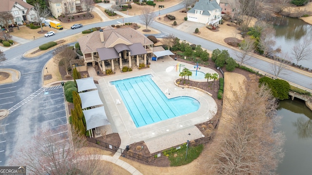 bird's eye view with a water view