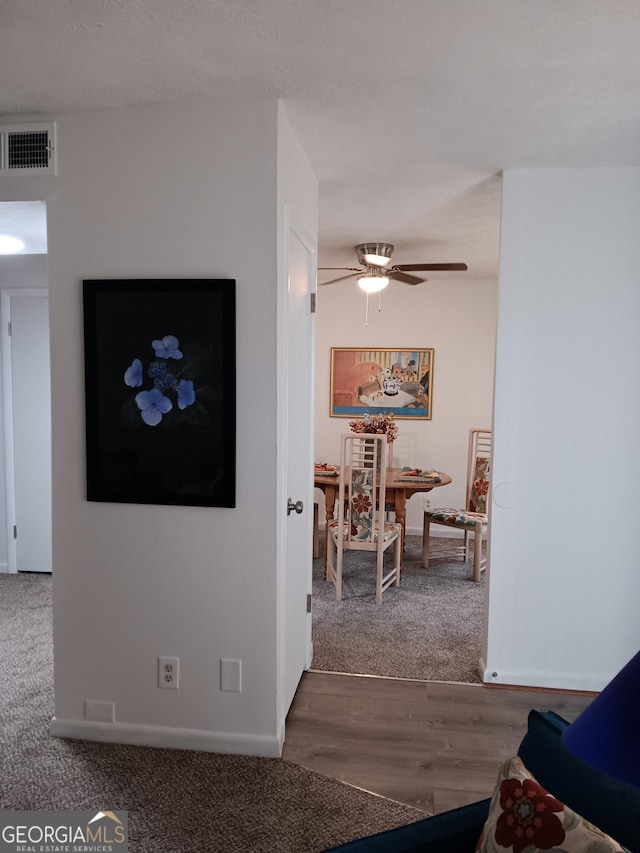 307 Adair St Unit E7, Decatur, GA 30030 - living room featuring baseboards, ceiling fan, and wood finished floors