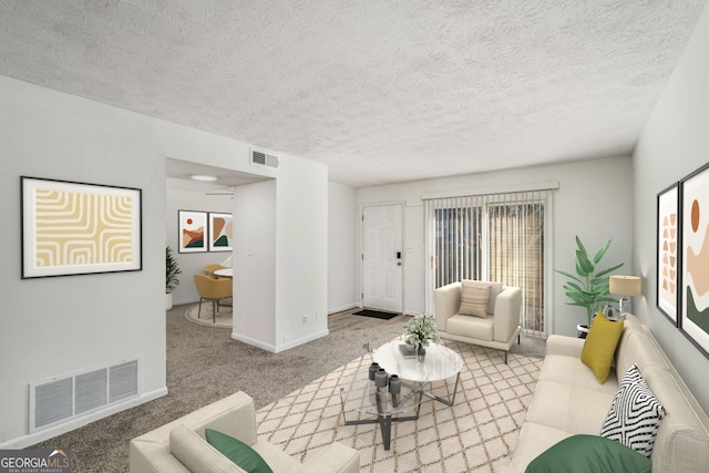 carpeted living room featuring a textured ceiling and baseboards