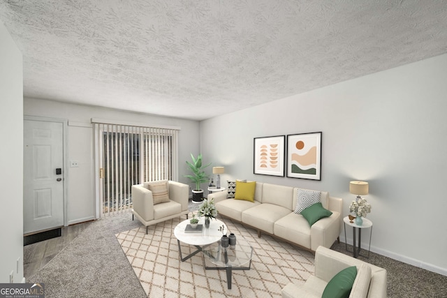 living area with baseboards, a textured ceiling, and wood finished floors