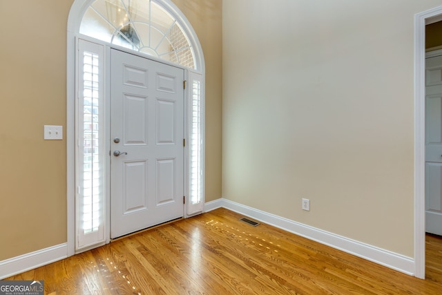 entrance foyer with light hardwood / wood-style flooring