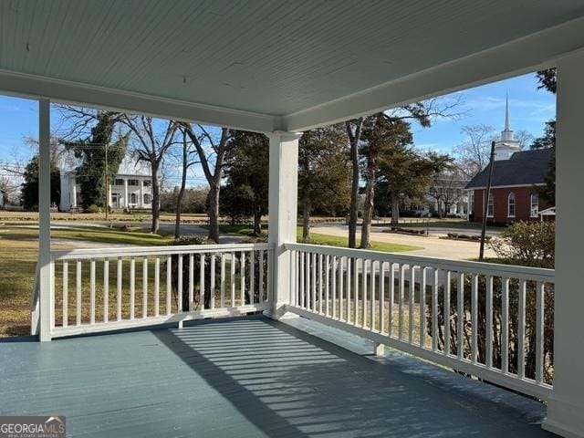 wooden deck featuring a porch