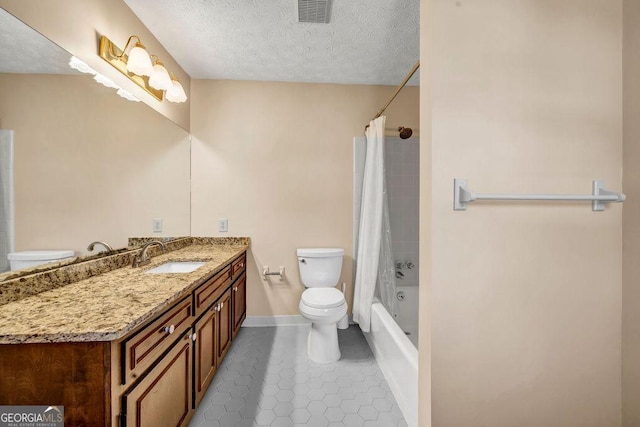 full bathroom with visible vents, toilet, a textured ceiling, vanity, and tile patterned flooring