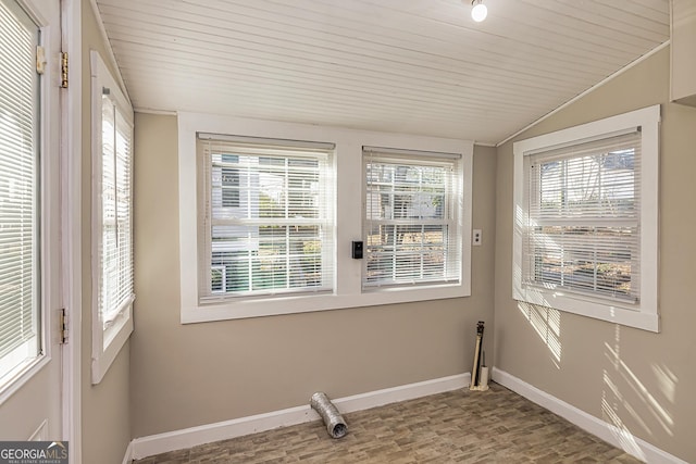 laundry area with a healthy amount of sunlight and wooden ceiling