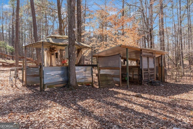 view of outdoor structure featuring an exterior structure and an outbuilding