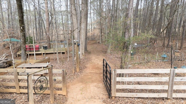 view of yard featuring a gate and fence