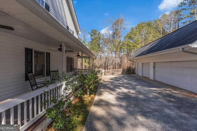 view of home's exterior featuring a ceiling fan and fence