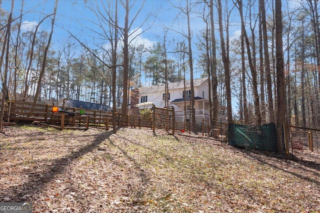 view of yard featuring fence