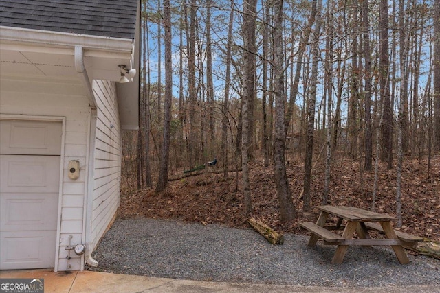 view of yard featuring a garage