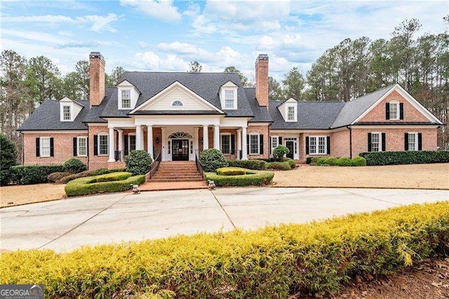3201 Hobsons Ridge Trl NW, Acworth, GA 30101 - view of front of house featuring a chimney, a porch, and brick siding