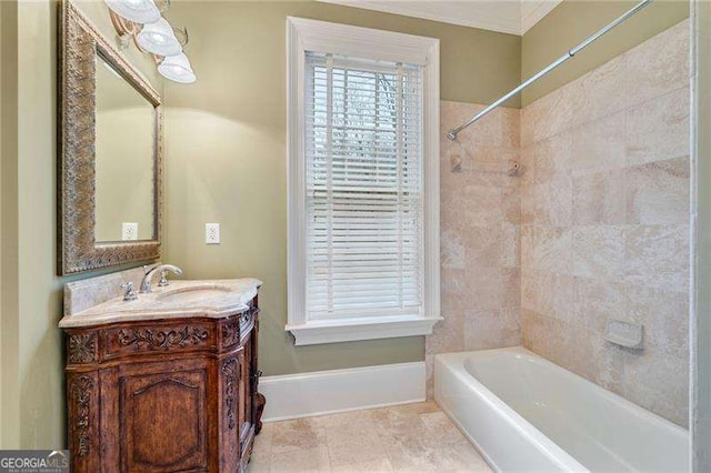 bathroom featuring ornamental molding and vanity