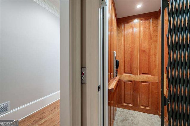 3201 Hobsons Ridge Trl NW, Acworth, GA 30101 - elevator with wood finished floors and ornamental molding