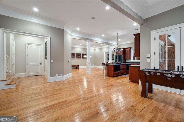 3201 Hobsons Ridge Trl NW, Acworth, GA 30101 - rec room with ornate columns, ornamental molding, light wood-style floors, recessed lighting, and a chandelier
